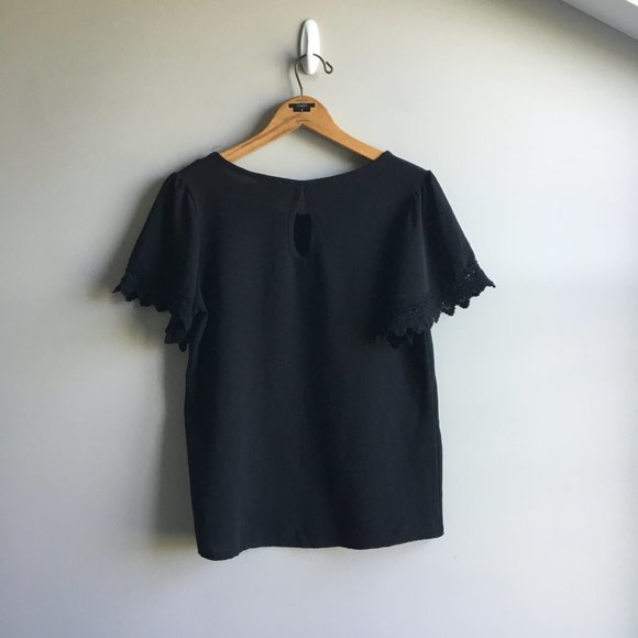 ⚪ 3/$15 Free Kisses black blouse with eyelet detail - Picture 6 of 9